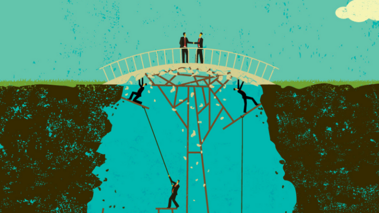 Two businesspeople shake hands on a crumbling bridge.