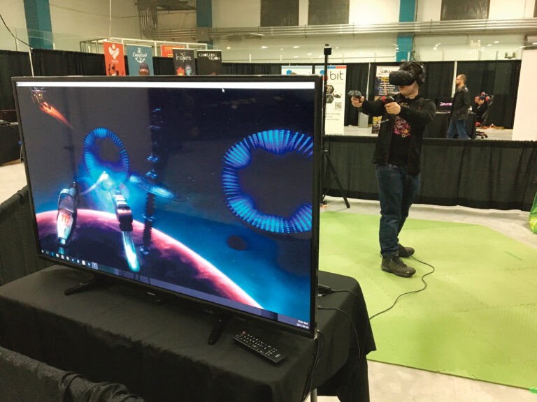 A gamer pivots to hit  virtual target at CGX 2017