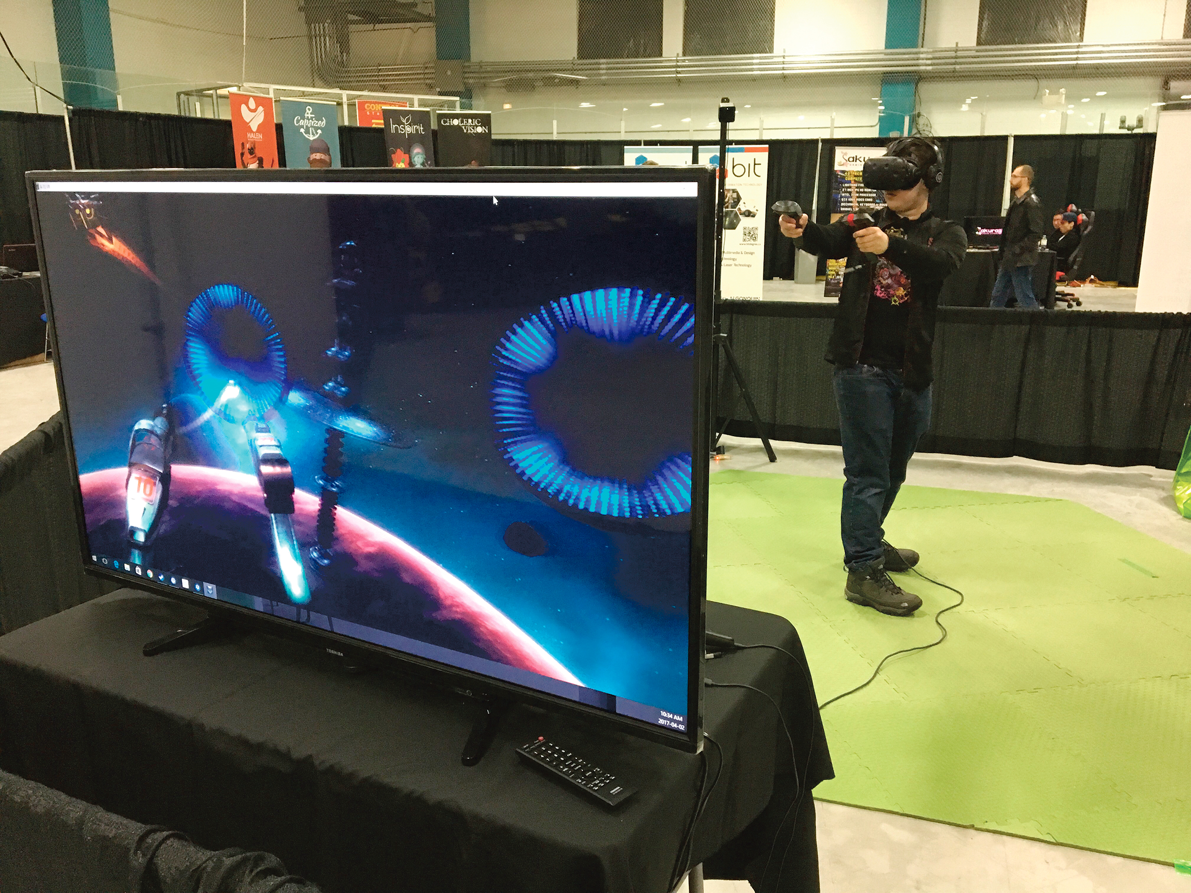 A gamer pivots to hit  virtual target at CGX 2017