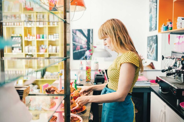 A woman works in a bakery