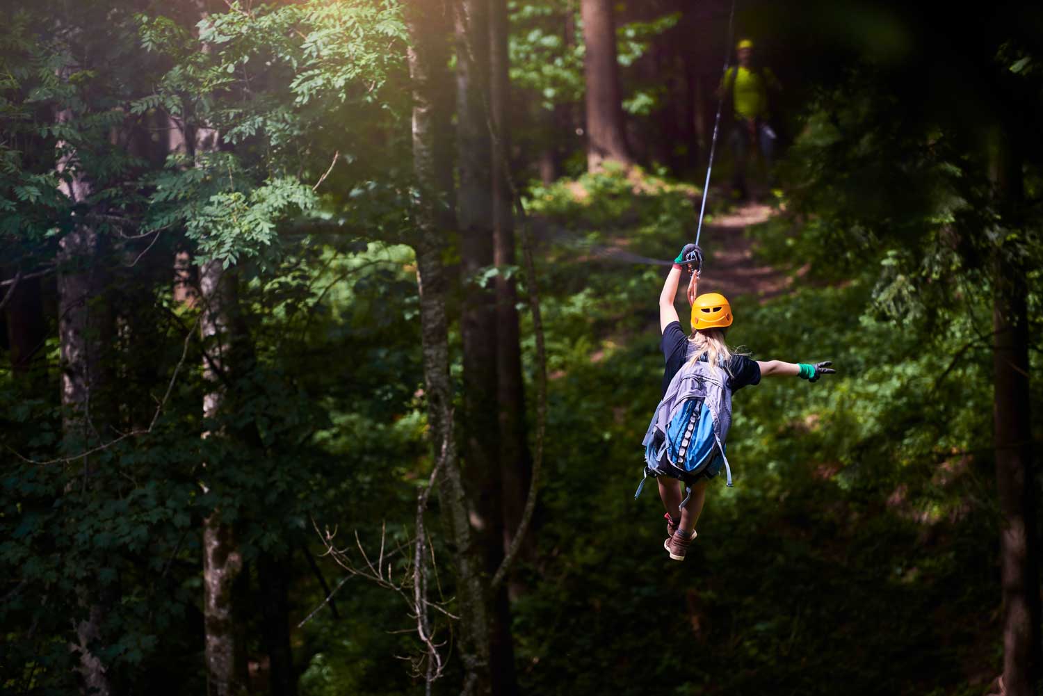 A woman ziplining