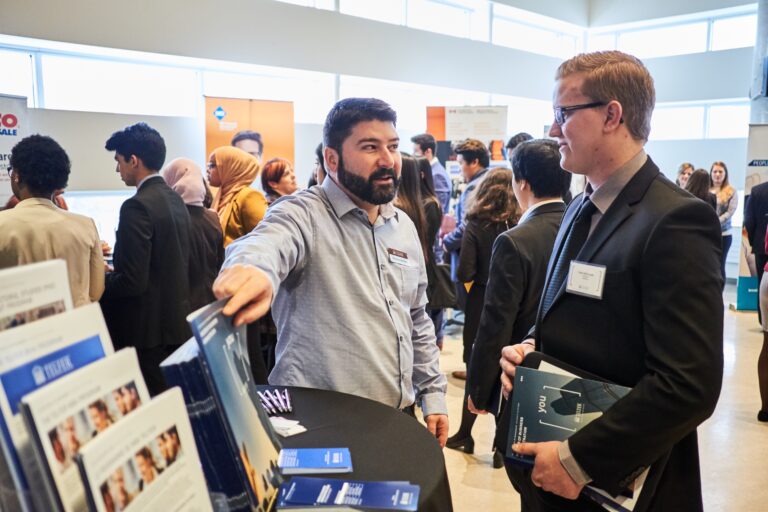 An employer speaks to an interested student