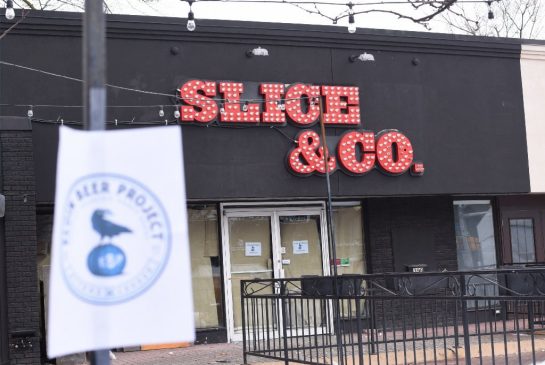 The windows of Slice and Co. have been papered up for months. The owners are getting ready to rebrand the pizzeria as a craft beer bar.