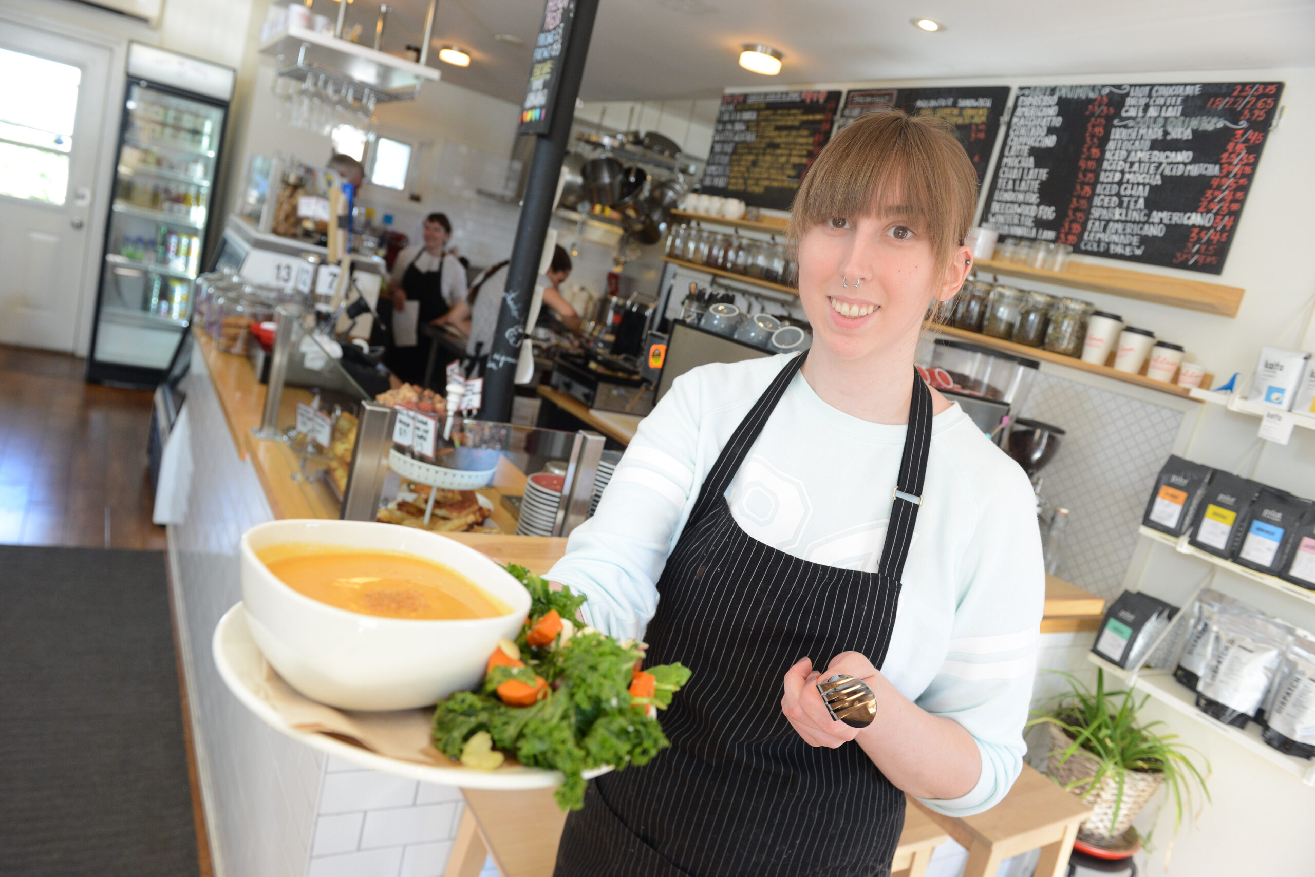 An employee of Red Door Provisions