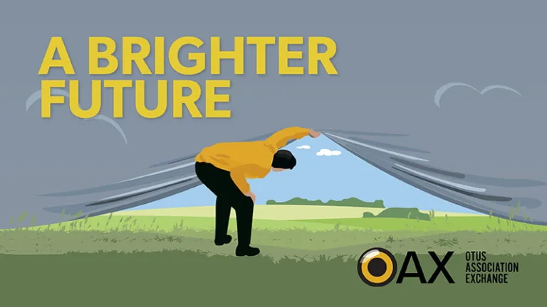 Image of a man peeking under a curtain to see a blue sky