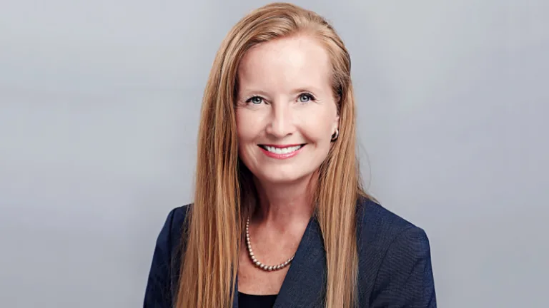 A head and shoulders portrait of a woman.