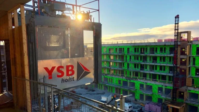 Photo of an external elevator used to construct a high rise building.