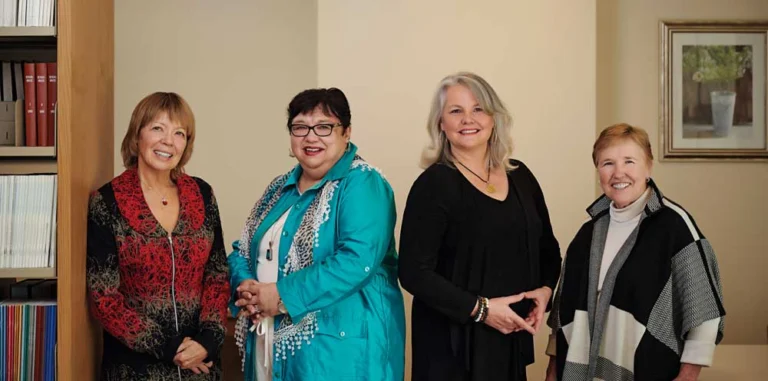 A photo of four women.