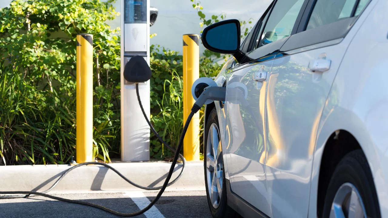 stock image of charging electric vehicle