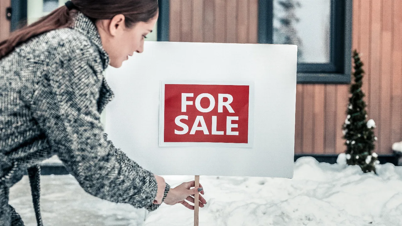 Winter home for sale sign home prices home sales