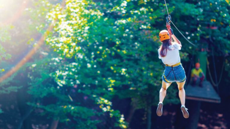 a woman ziplining