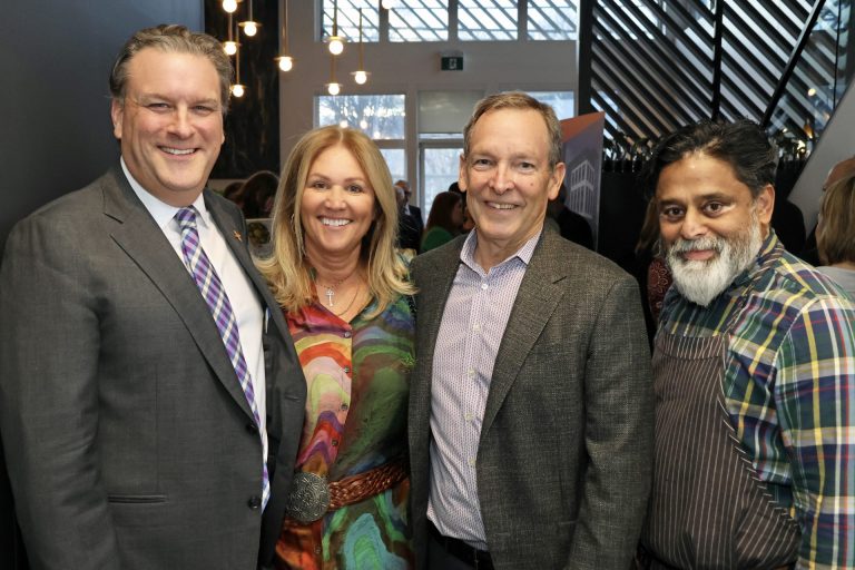 From left, David Gourlay, CEO of Shepherds of Good Hope Foundation, alongside campaign co-chairs and donors Mary Taggart and Chris Taggart, and Coconut Lagoon restaurant owner and executive chef Joe Thottungal at the Shepherds' launch of its $5-million capital campaign for its new eight-storey, multi-purpose supportive housing residence in the ByWard Market. Photo by Caroline Phillips