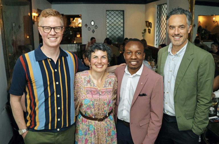 From left, Parkdale Food Centre (PFC) board member, event host Alex Wilson, PFC executive director Beth Ciavaglia, former PFC board member Landry Kalembo, and North & Navy restaurant co-owner Chris Schlesak at the North & Navy dinner held in support of the PFC on Thursday, May 23, 2024. Photo by Caroline Phillips