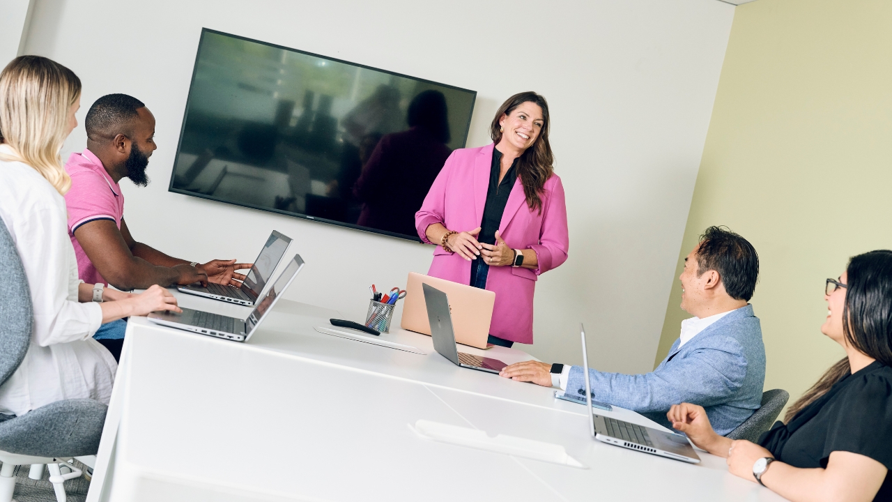 Susan Richards of Numbercrunch presents at meeting to discuss revenue strategies.