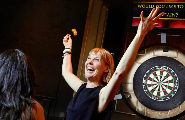 Stephanie Aloia from Keynote Search was possibly the most fun to watch at the inaugural Darts for Charity fundraiser held in support of the Senators Community Foundation at Manor Lounge on Wednesday, June 5, 2024. Photo by Caroline Phillips