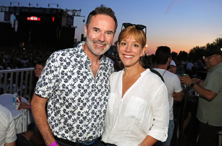 Marjolaine Hudon, outgoing regional president of RBC, and her husband, John McCourt, on Sunday, July 7, 2024, in RBC's corporate VIP suite for Ottawa Bluesfest. Photo by Caroline Phillips