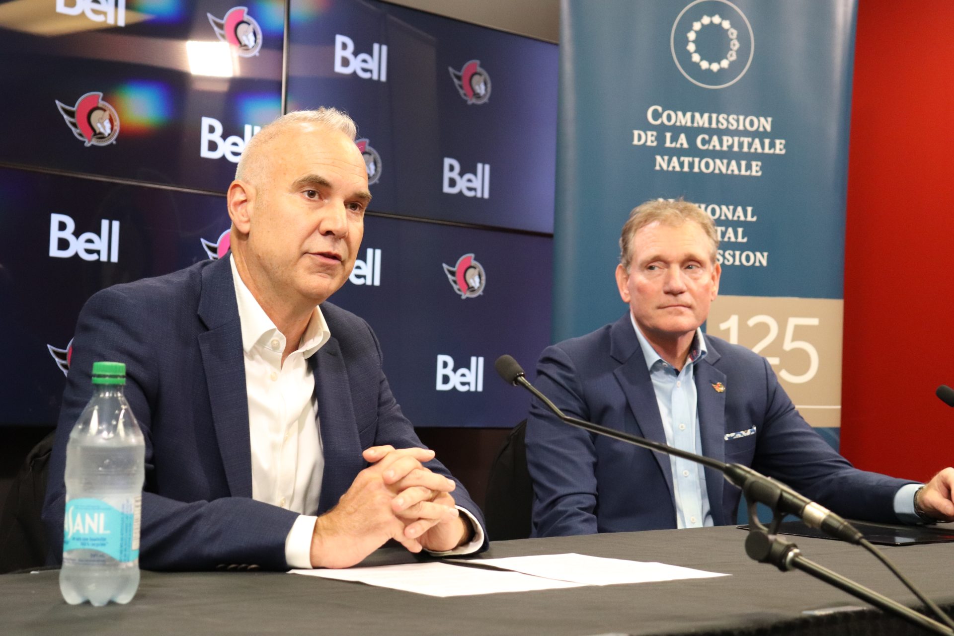 NCC chief executive Tobi Nussbaum (left) and Senators president and CEO Cyril Leeder announce the deal at the Canadian Tire Centre Friday. (Photo by Mia Jensen)