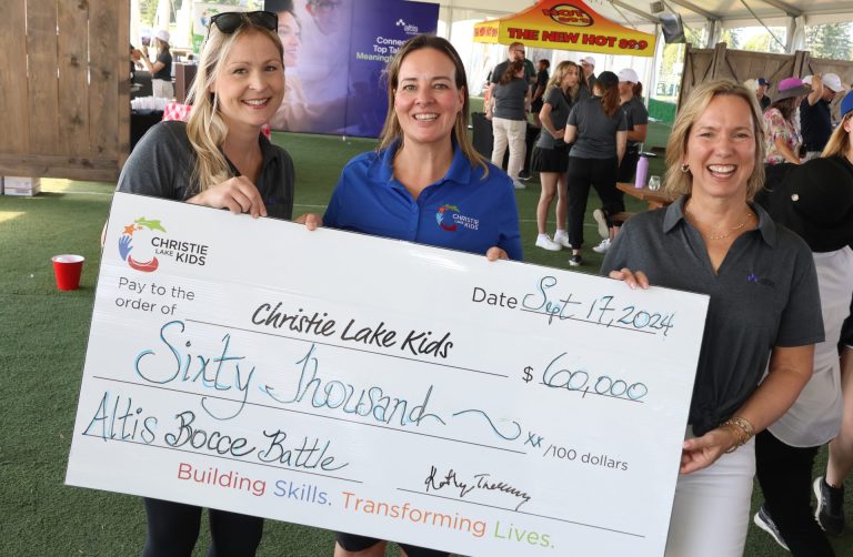 From left, Nicole Vanbergen, Natalie Benson and Kathryn Tremblay with the ceremonial cheque revealing the net total raised at the start of the Altis Bocce Battle held at Wesley Clover Parks on Tuesday, Sept. 17, 2024, in support of Christie Lake Kids. Photo by Caroline Phillips