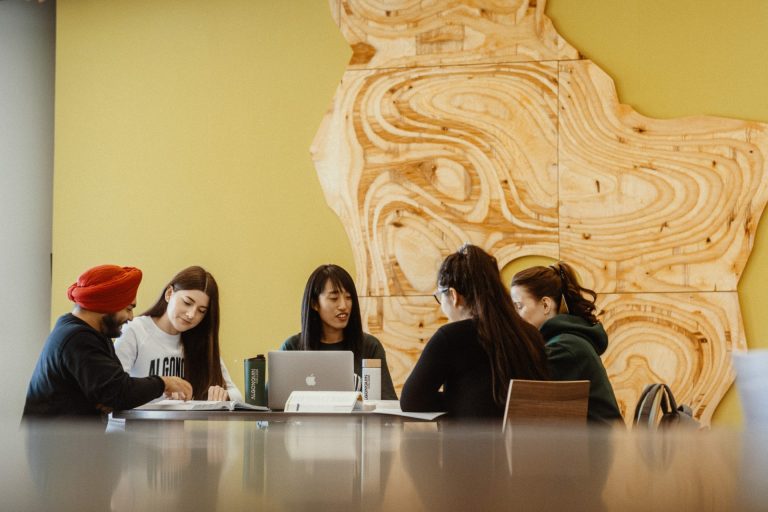 Algonquin College business students converse during their studies