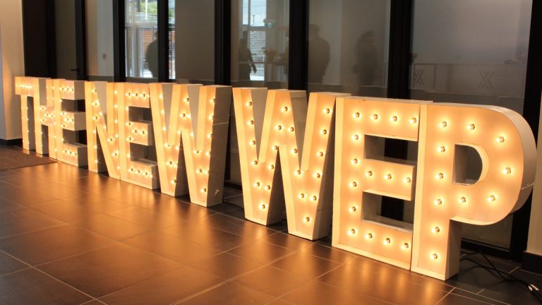 light up letters that read "the new WEP"