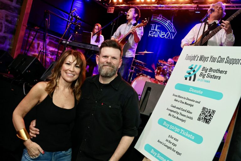Big Brothers Big Sisters Ottawa board member Carrie Irvine, founder and CEO of Carrie Irvine Communications, and Ottawa business development leader Ted Carty, founder of the Capital Professionals Open Mic, at the Rainbow Bistro on Friday, April 5, 2024 for the third edition of CAPO in support of BBBSO. Photo by Caroline Phillips