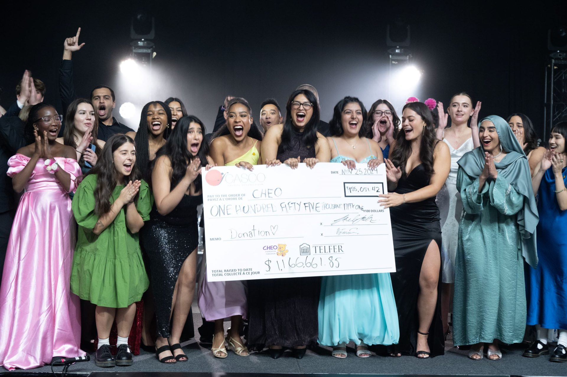 CASCO celebrates it's 25th year and raises $155,051 for CHEO. CASCO executive team celebrates at cheque reveal.