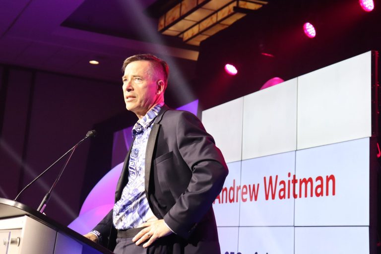 Andrew Waitman, CEO of Assent, accepts the 2024 CEO of the Year award. (Photo by Mia Jensen)