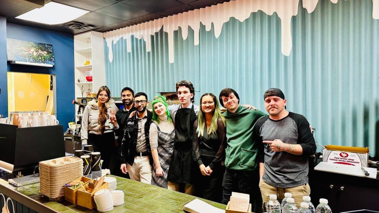 EveryPerson Cafe staff at their launch event on Jan. 22. Left to right: Tasha (barista), Daniyal (Co-Owner), Mohannad (Co-Owner), Violet (Barista), Val (General Manager), Michelle (Barista), Gavriel (Barista), Gabe @indoartamus (community artist). Photo provided.