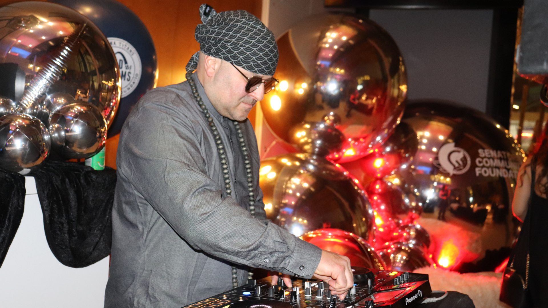 DJ Rise Ashen entertains guests at the 5th annual SnowBall. Photo by Mia Jensen
