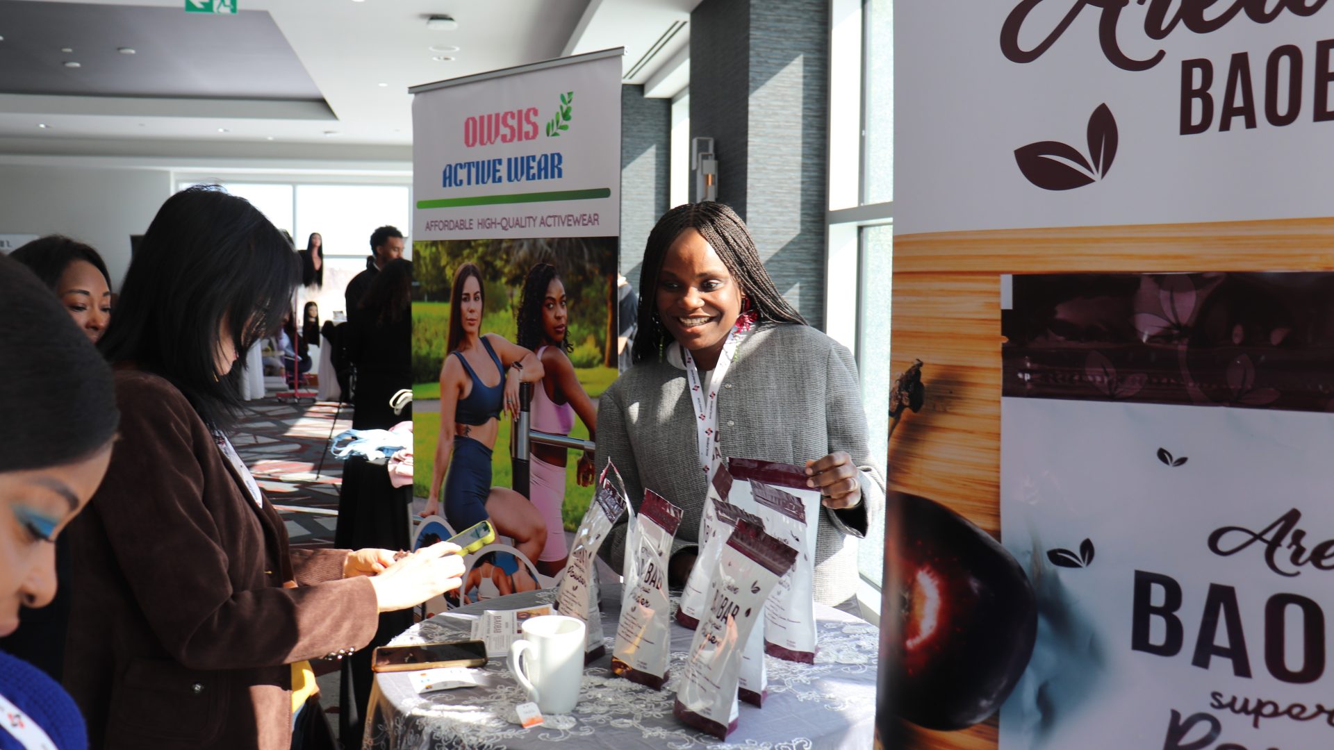Oluyinka-Oso (right), co-founder of Arewa Baobab, chats with guests at the Building our Future event at the Brookstreet Hotel Feb. 28, 2025. Photo by Mia Jensen