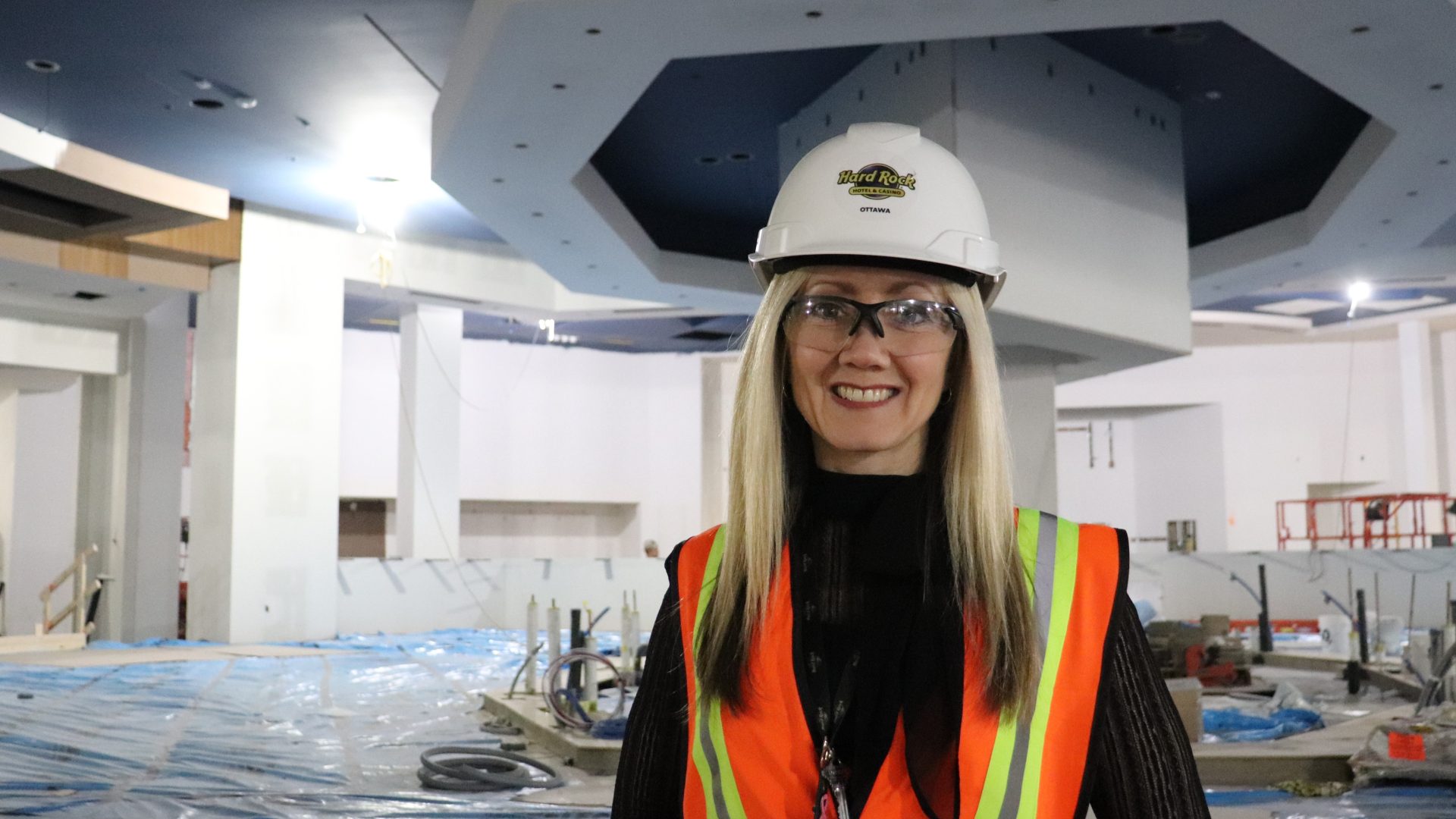 Christine Crump, president of Hard Rock Hotel and Casino Ottawa, stands in the middle of what will become the property's new casino floor when it opens later this year. Photo by Mia Jensen)