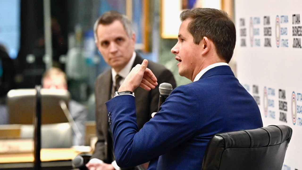 David Coletto, CEO of Abacus Data, speaking with Mayor Mark Sutcliffe at the Mayor's Breakfast networking event on April 22, 2025. Photo by Mark Holleron.