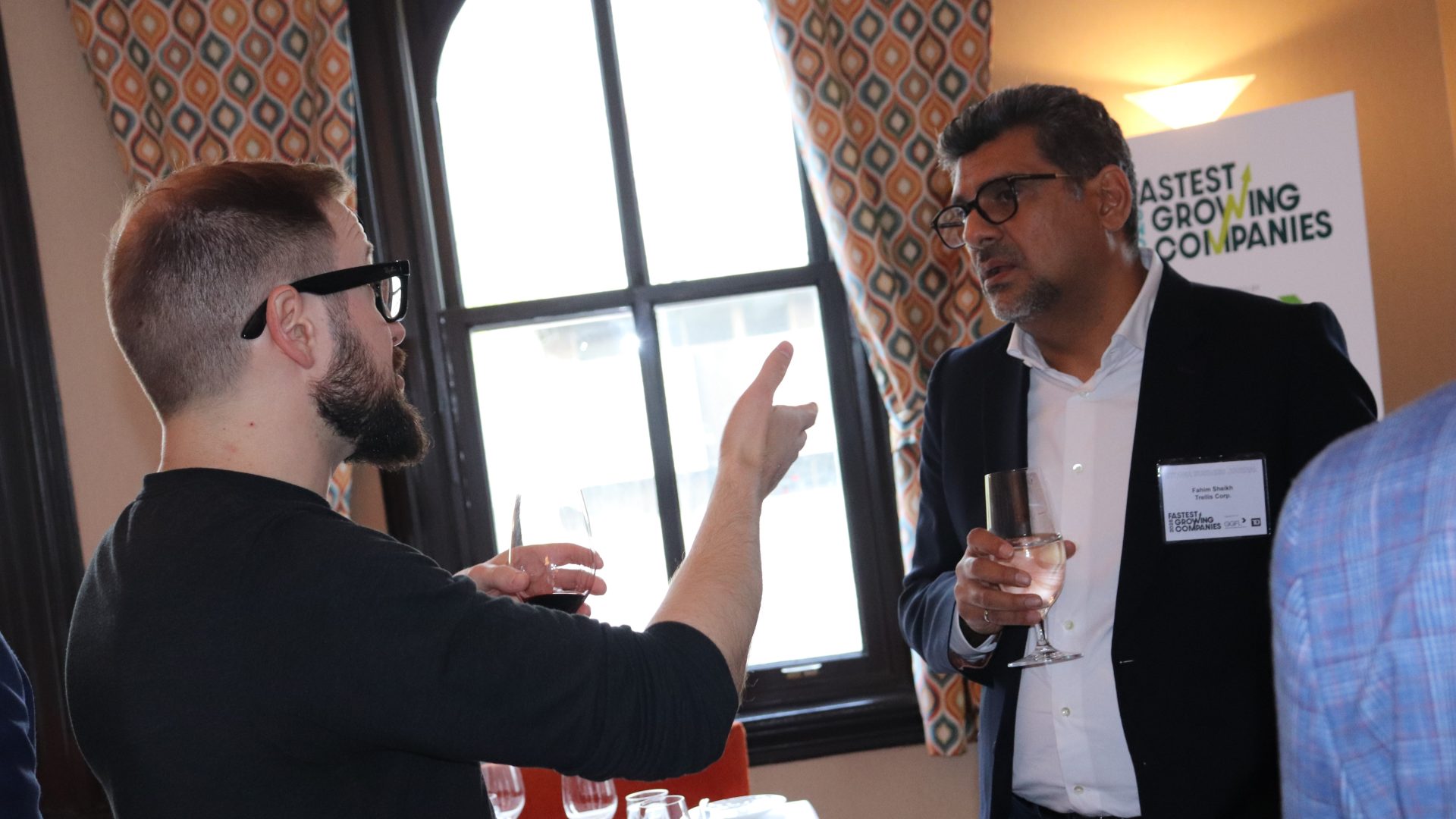 From left: Fastest growing companies recipients Frank Bouchard (Wipebook) and Fahim Sheikh (Trellis) chat before dinner at Beckta Dining and Wine. Photo by Mia Jensen