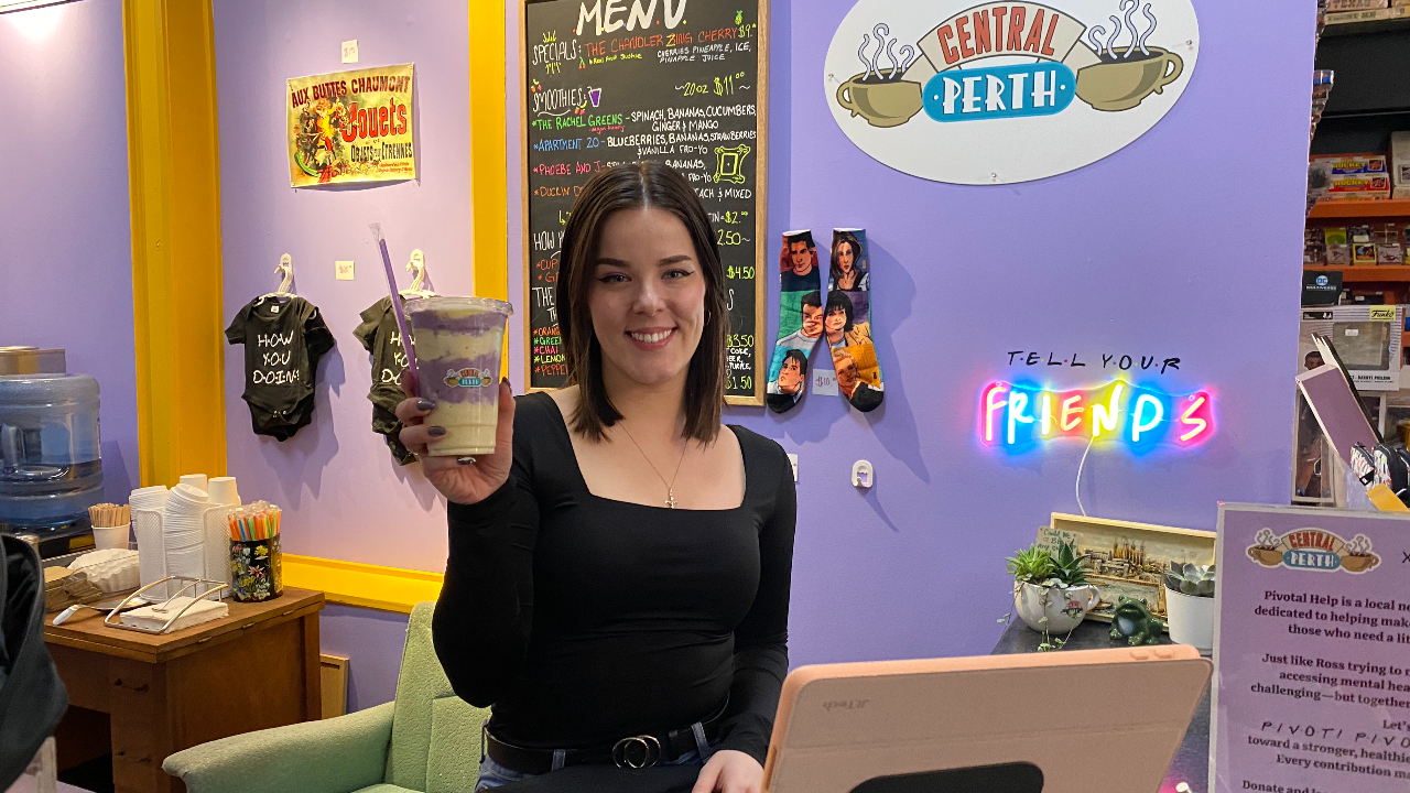 Central Perth owner Mj Laidlaw with a freshly blended “Duckin’ Delicious” smoothie (made with peaches, berries and vanilla frozen yogurt). Photo by Laura Byrne Paquet.