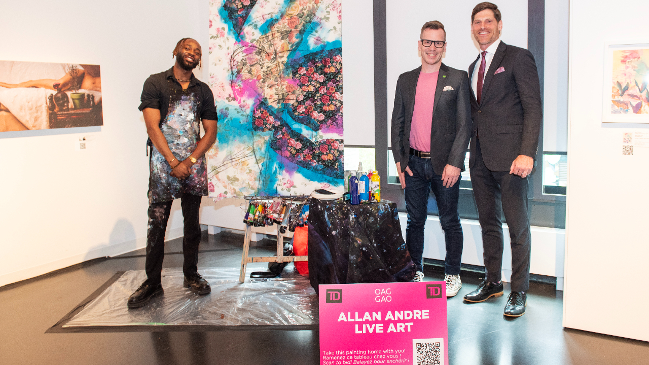 Live art with artist Allan Andre, with Lee Rose and Colin Noble from TD Bank at the Ottawa Art Gallery Paint the Town Pink art auction May 29, 2025 at the OAG. Photo by Tia MacPherson.