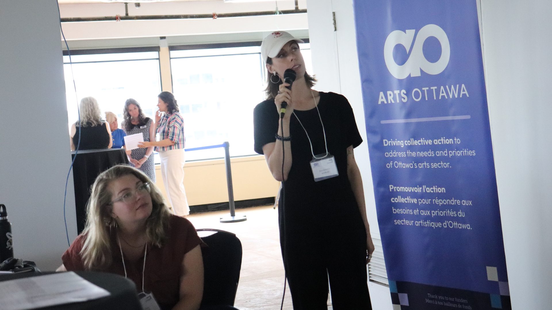 Alex Glass (left) and Eva Hellreich of ArtsBuild Ontario present at Shared Ground, an event organized in partnership with Arts Ottawa. Photo by Mia Jensen