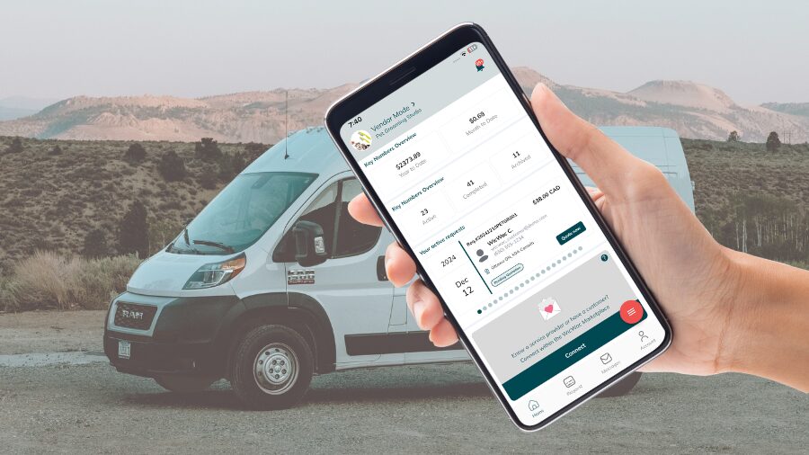 Service van with the WicWac app displayed on a cellphone