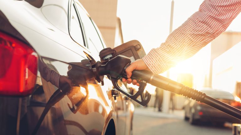 Person pumping gas