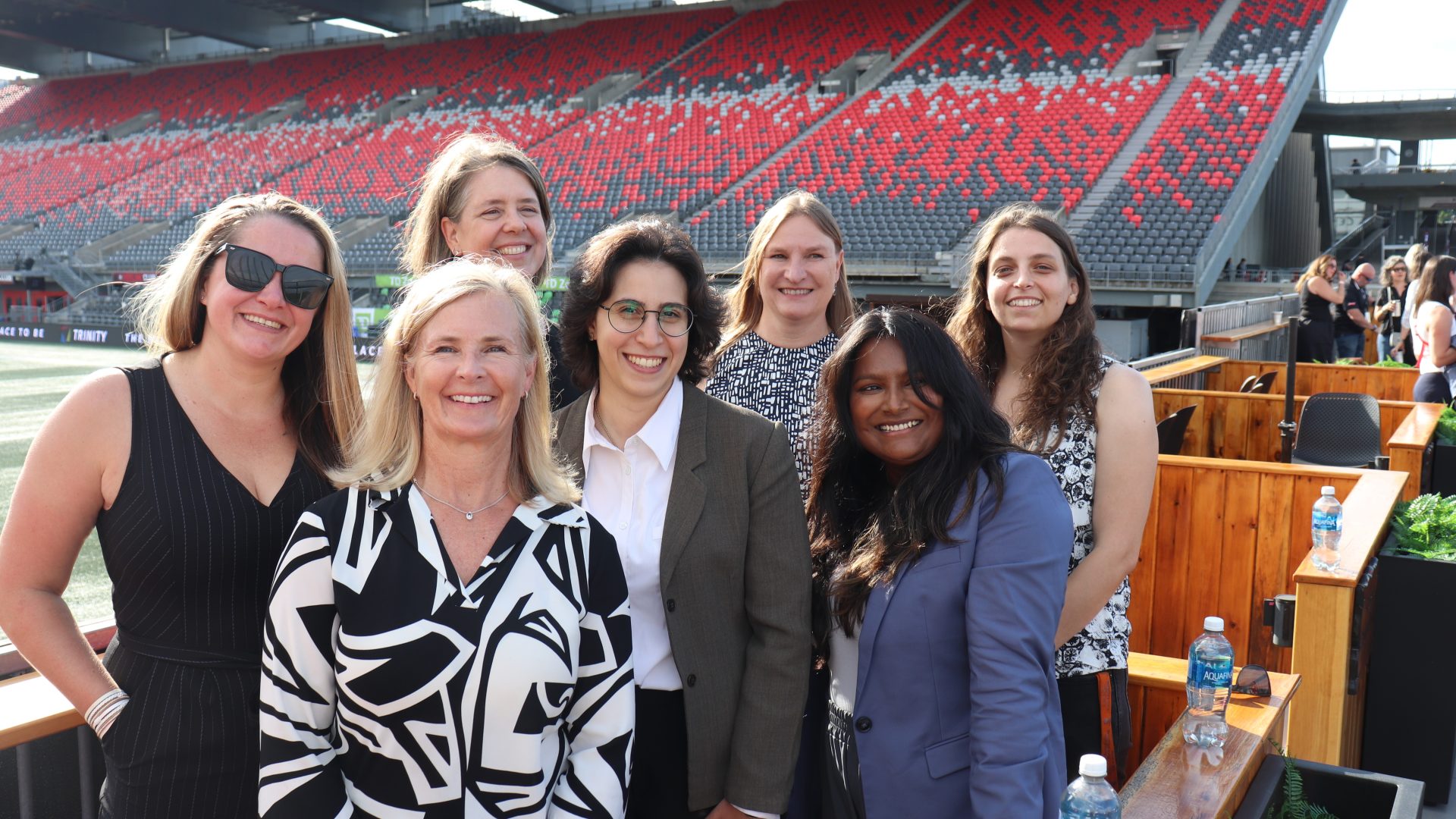 From left: Tiffani Westerman (Wesley Clover Services), emcee Veronica Farmer (Wesley Clover), Heidi Adams (Nokia), Marwa Wazzi (CENGN), Deep Shree (Ericsson), Ingrid Mag (Dragonfly Services) and Marie Ashman (Nordion) at the Op-HER-ations of Tech panel at TD Place on Thursday. Photo by Mia Jensen