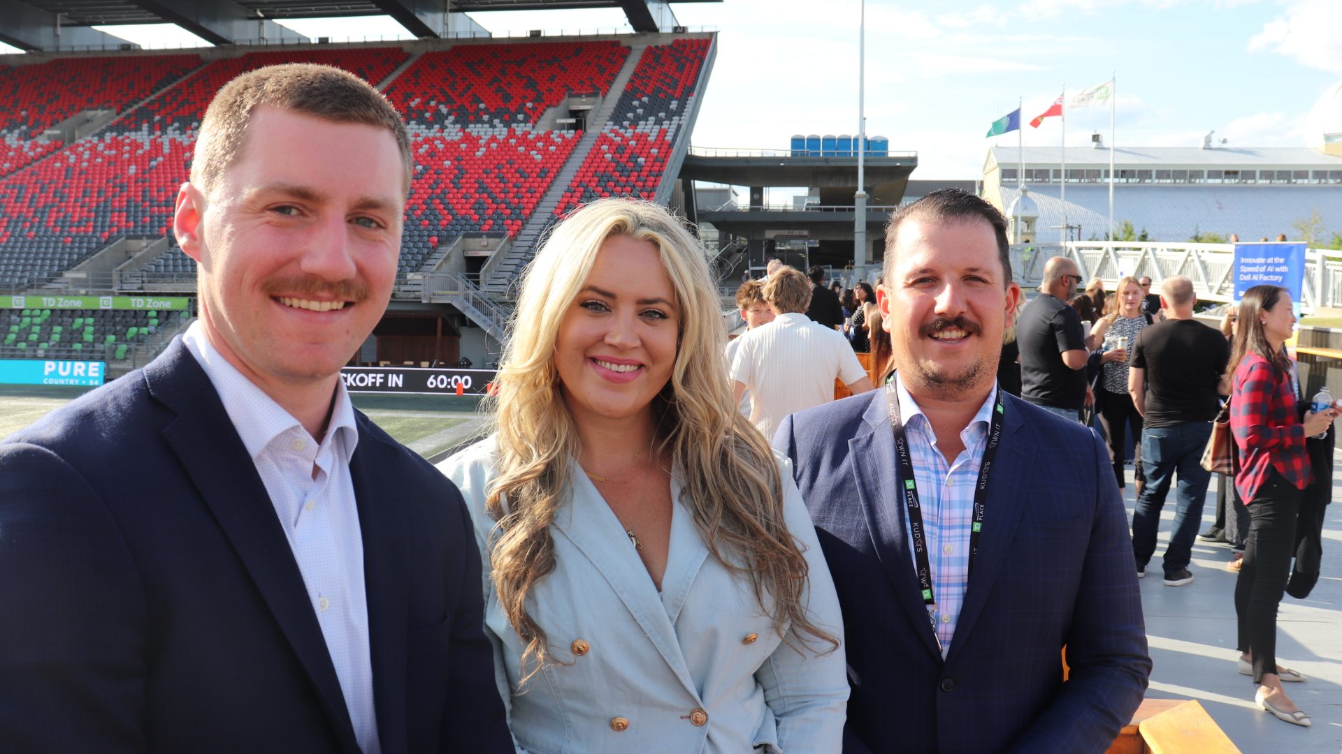 OSEG event organizers Mitch Schnitzler (left) and Broadie Gagnon with Jaclyn Eisenmann of GRC Concierge at the Op-HER-ations of Tech panel at TD Place on Thursday. Photo by Mia Jensen