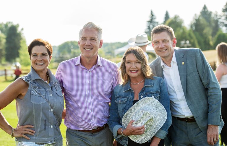 Spurs & Sparkles co-chair Catherine McLaughlin; Glenn Sheen, RBC’s regional director of marketing and citizenship; Queensway Carleton Hospital Foundation president and CEO Shannon Gorman; and RBC’s Justin Schurman, regional vice-president of business financial services, Spurs & Sparkles for QCH Foundation at Wesley Clover Park, August 13, 2025. Photo by Tia MacPherson.