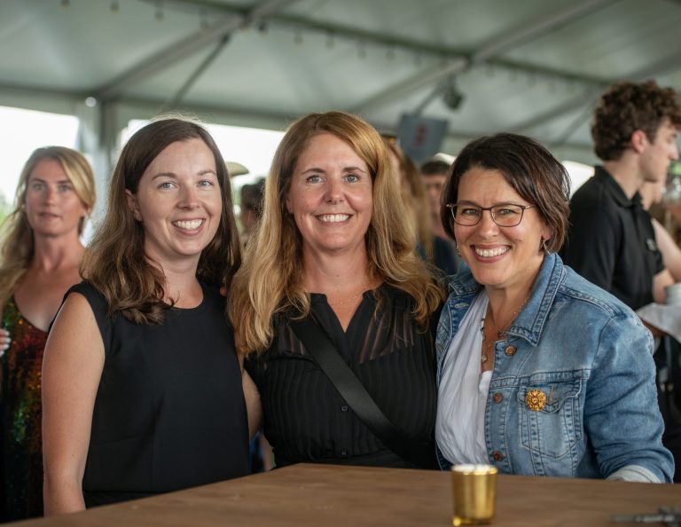 A few of the amazing staff at the Queensway Carleton Hospital, Chelsey Green (clinical and medical informatics supervisor), Mia VanBemmel (people and performance improvement specialist), and Yvonne Wilson (vice-president patient care and chief nurse executive) at Spurs & Sparkles for QCH Foundation at Wesley Clover Park, August 13, 2025. Photo by Tia MacPherson.