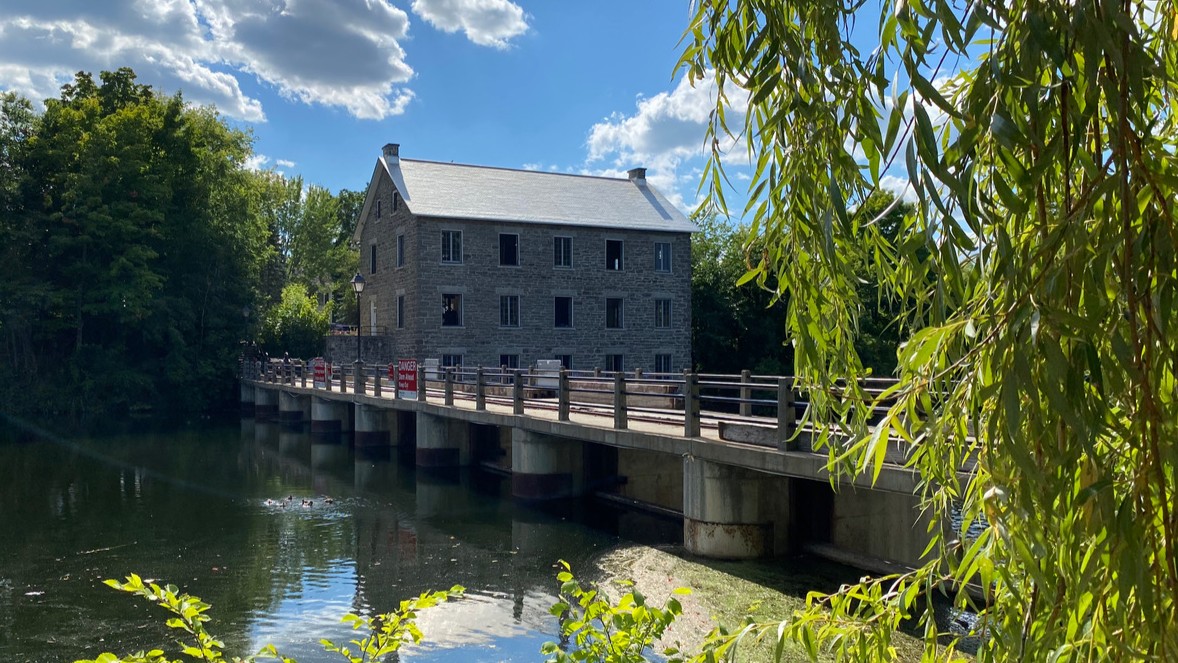 Watson’s Mill on the Rideau River has been a Manotick landmark since the 1860s. Photo by Laura Byrne Paquet