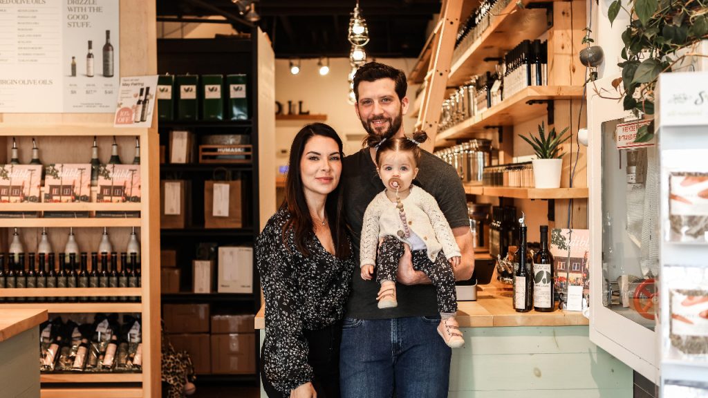 Mike George, owner of Aurelius Fine Oils & Balsamic Vinegars and The Unrefined Olive, with his wife and daughter. Photo supplied.