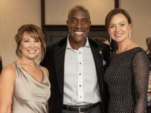 Carrie Irvine (Carrie Irvine Communications), event sponsor Duane Francis (Duane Francis Wealth Management) and his wife Julie at Fight for the Cure, Westin, October 18th, 2025. Photo by Tia MacPherson for OBJ.