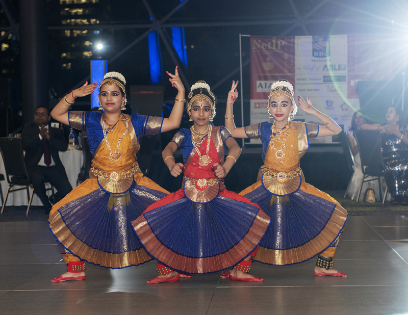 KALAGRIHA SCHOOL OF PERFORMING ARTS "Pushpanjali-Mooshika Vahana", which pays homage to Lord Ganesha. Choreographed by: Smt Stuti Mukherjee Performed by: Manasvi Kumar, Medhya Sharma and Keerthana Praveen at NetIP Canada 10th Annual Diwali Awards Gala, Rogers Center, October 3rd, 2025. Photo Credits: Tia MacPherson from Ottawa Business Journal