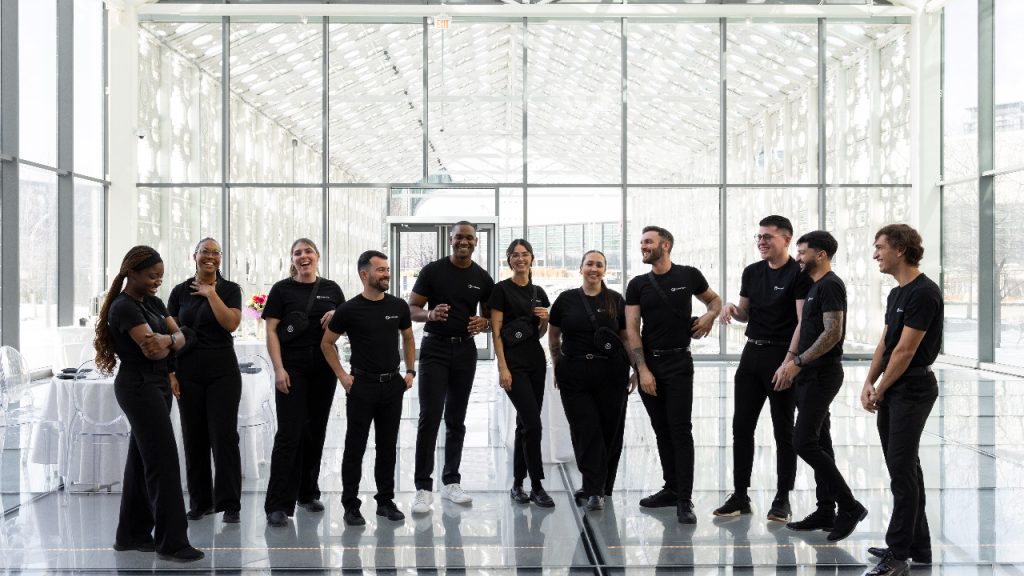 Harrison Staffing CEO Danny Murrell (fifth from left) is bringing his Toronto-based event staffing firm to Ottawa. Photo supplied.