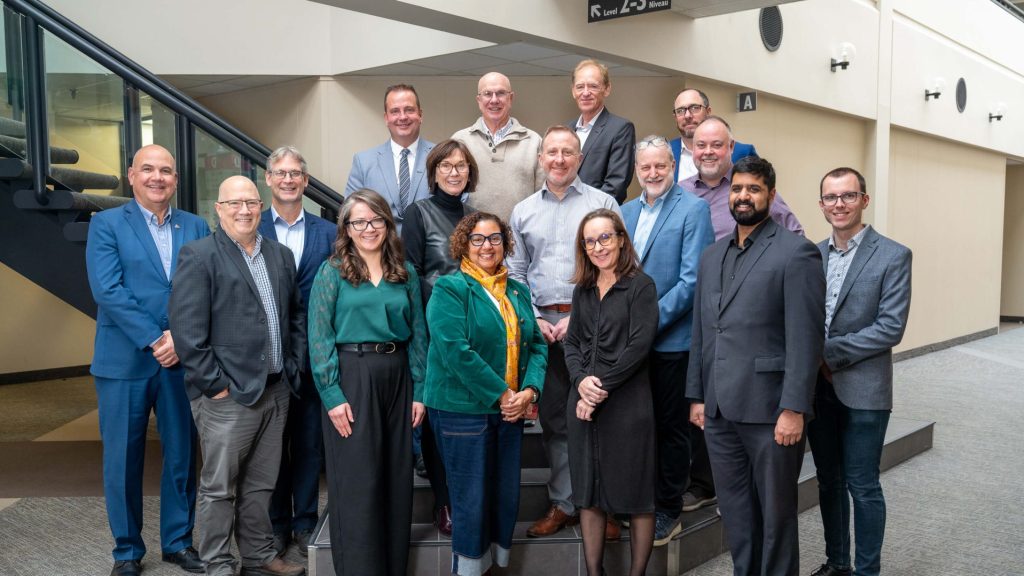 Cornwall business and economic leaders gathered on Nov. 24, 2025 at the DEV Hotel & Conference Centre. Back row left to right: Matthew Stephenson, Terry Landon, Terry Tyo, Ian Bentley. Middle row left to right: Tim Mills, Jeff Ridal, Jeannette Despatie, Chris Markell, Claude Losier, Michael Curran. Front row left to right: Bob Peters, Kathleen Rendek, Senator Bernadette Clement, Chantal Paillé, Justin Towndale, Phil Goudreau.