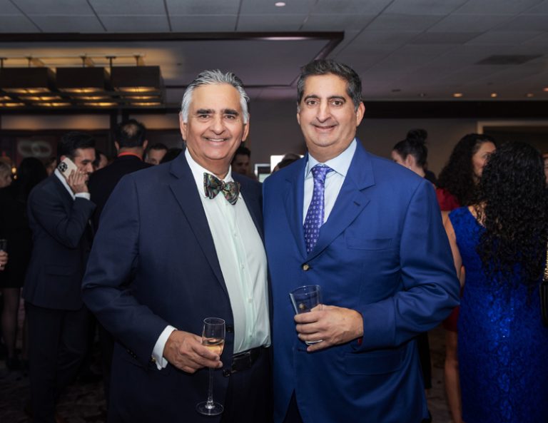 Bill Malhotra (CEO at Claridge Homes) and his son Neil Malhotra (CFO at Claridge Homes), who has been named 2025 CFO of the Year by the Ottawa Board of Trade and the Ottawa Business Journal, at the Best Ottawa Business Awards (BOBs) at The Westin Hotel, Nov 28, 2025. Photo by Tia MacPherson for OBJ.