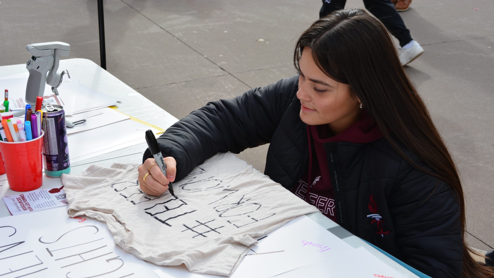 Students adding their opinions for the “Your Voice is On The Line” initiative